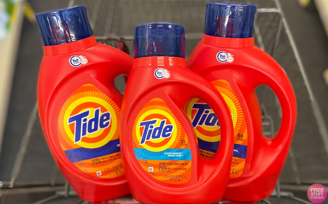 3 Tide Detergent Bottles in a Shopping Cart