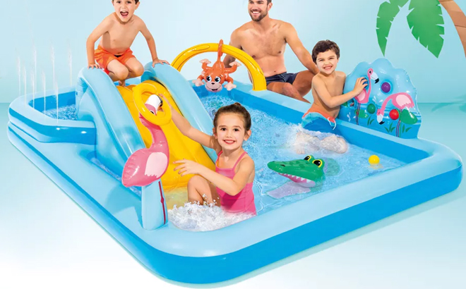A Family Having Fun in the Intex Inflatable Jungle Adventure Play Center Spray Kiddie Pool