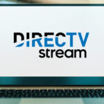 A Laptop with DIRECTV Stream on the Background