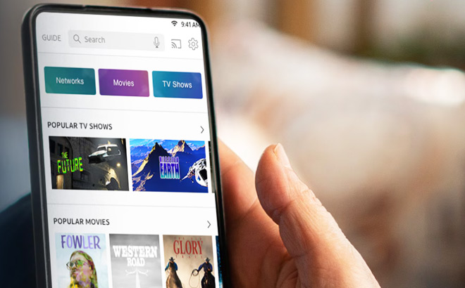 A Person Browsing Popular TV Shows and Movies on DIRECTV STREAM App