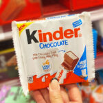 A Person Holding a Kinder Chocolate