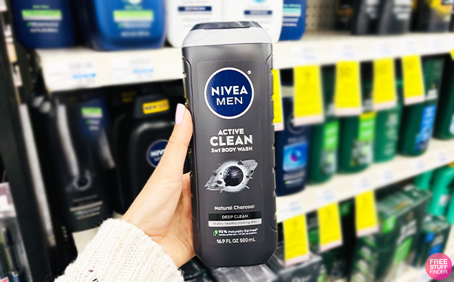 A Person Holding NIVEA MEN Deep Active Clean Charcoal Body Wash