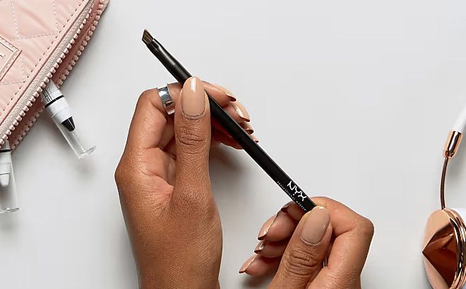 A Person Holding NYX Professional Makeup Pro Angled Eyeliner Brush