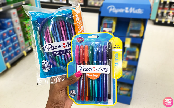 A Person Holding Paper Mate Products