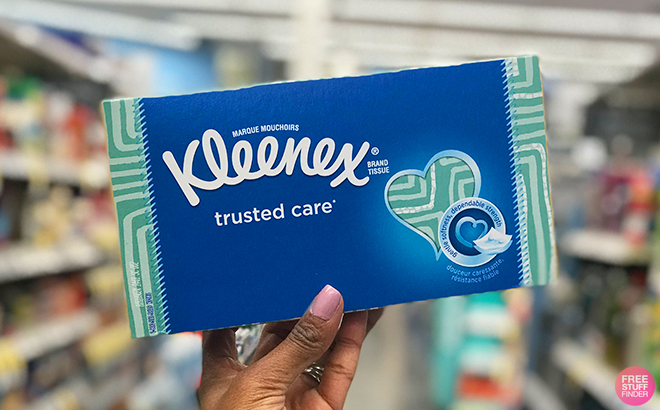 A Person Holding the Kleenex Trusted Care Facial Tissues Box at CVS