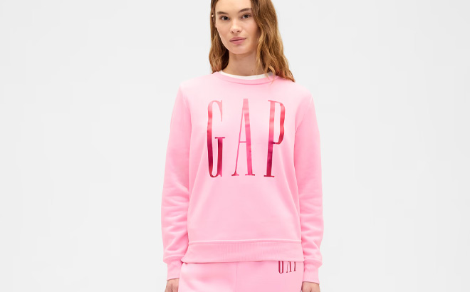 A Person Wearing GAP Factory Relaxed Gap Logo Sweatshirt