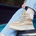 A Person Wearing Hey Dude Wendy Peak Apres Suede Boots