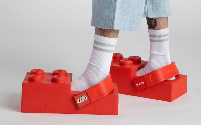 A Person wearing LEGO Crocs Brick Clogs