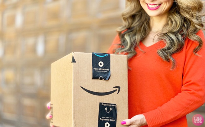 Woman Holding an Amazon Baby Welcome Box