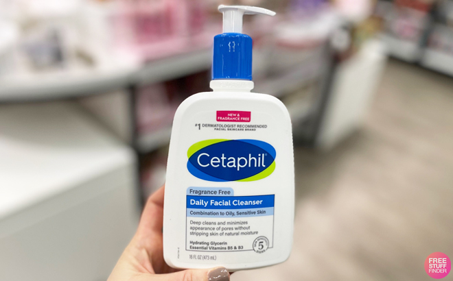 Hand Holding Cetaphil Facial Cleanser Fragrance Free 16 Ounce