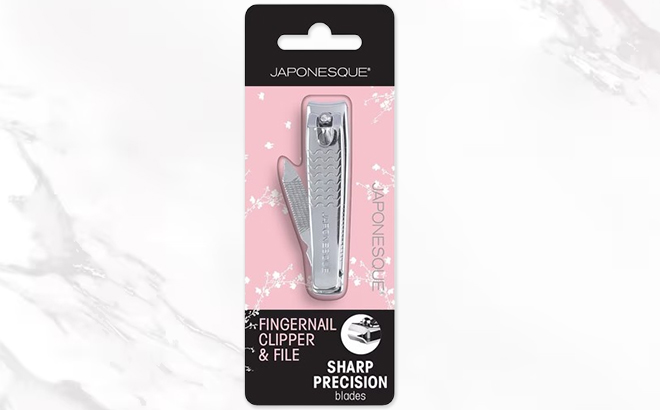 Japonesque Fingernail Clipper and File on a Marble Tabletop