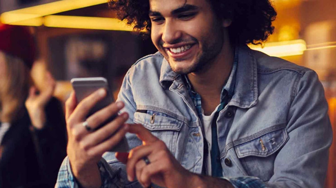 Man Holding a Mobile Phone