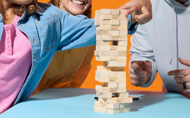 People Playing Hasbro Jenga Game
