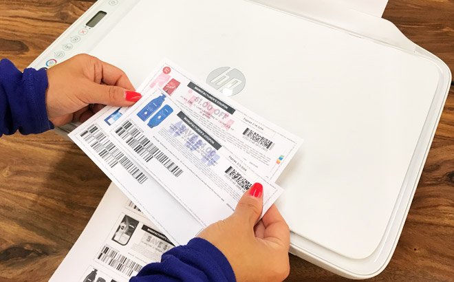 A Hand Holding Coupons A Hand Holding Coupons
