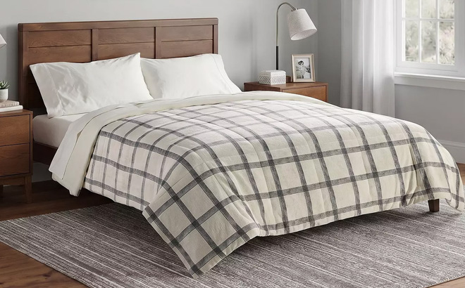 The Big One Plush Down Alternative Reversible Comforter on the Bed